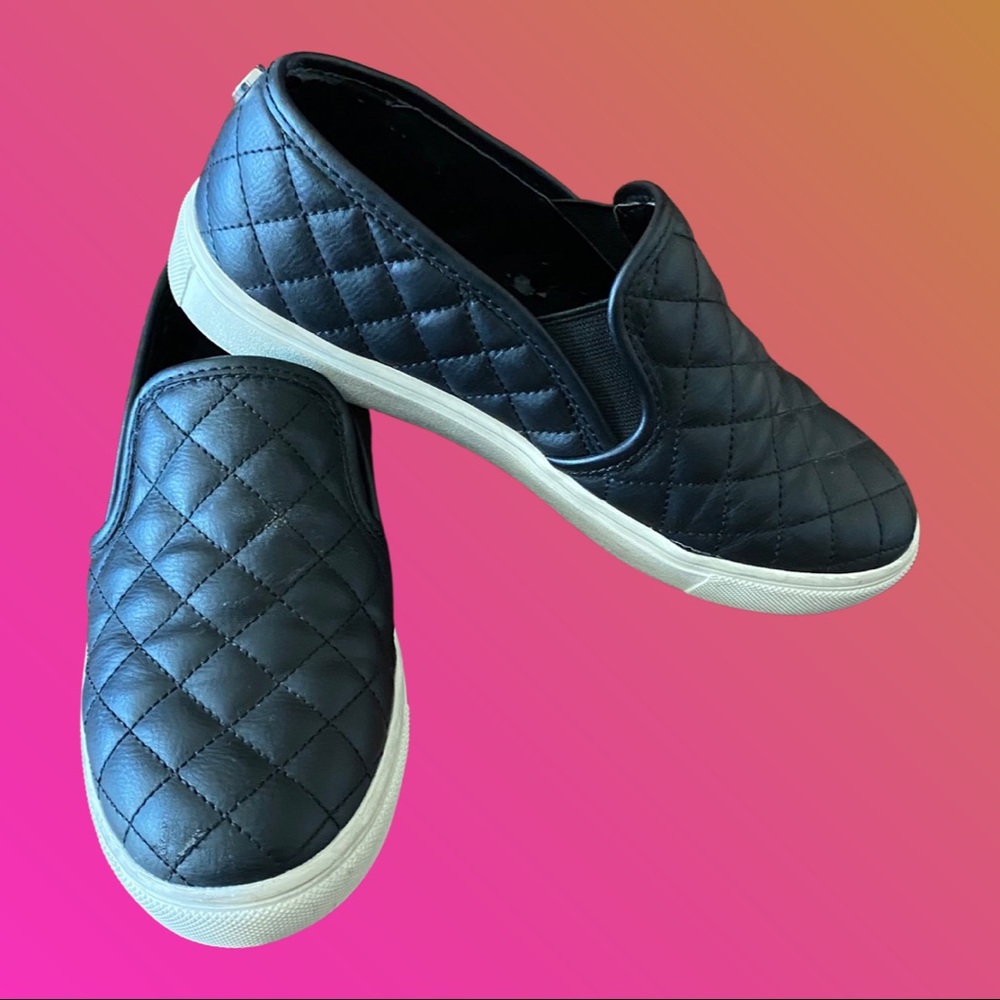 Black quilt style slip on tennis shoes good shape with a couple small scuffs